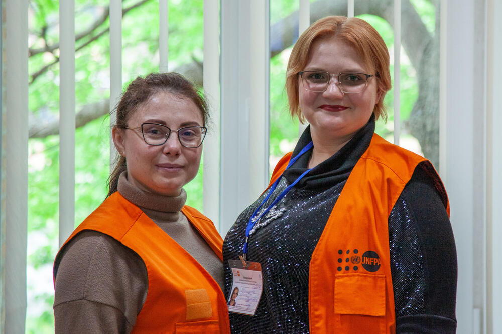 Two women smiling