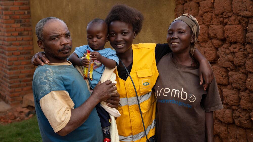 A family smiles together.