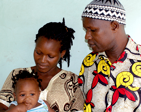 Mother and father with their baby.