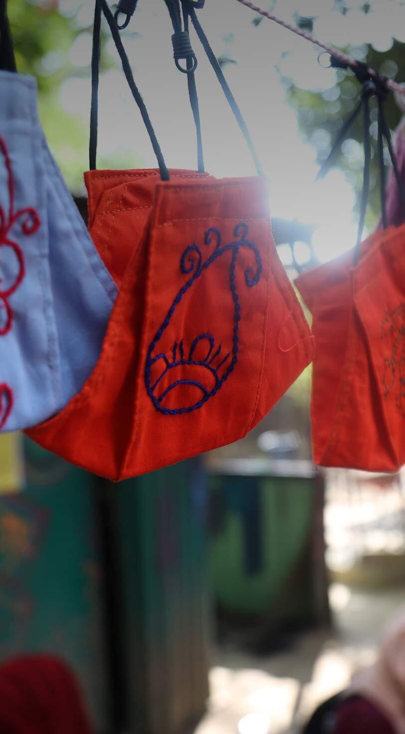 A Rohingya women’s group in the refugee camp of Cox’s Bazar, Bangladesh, came together to produce hand-made, reusable masks so they can make a living, boost their skills and help to protect their community.